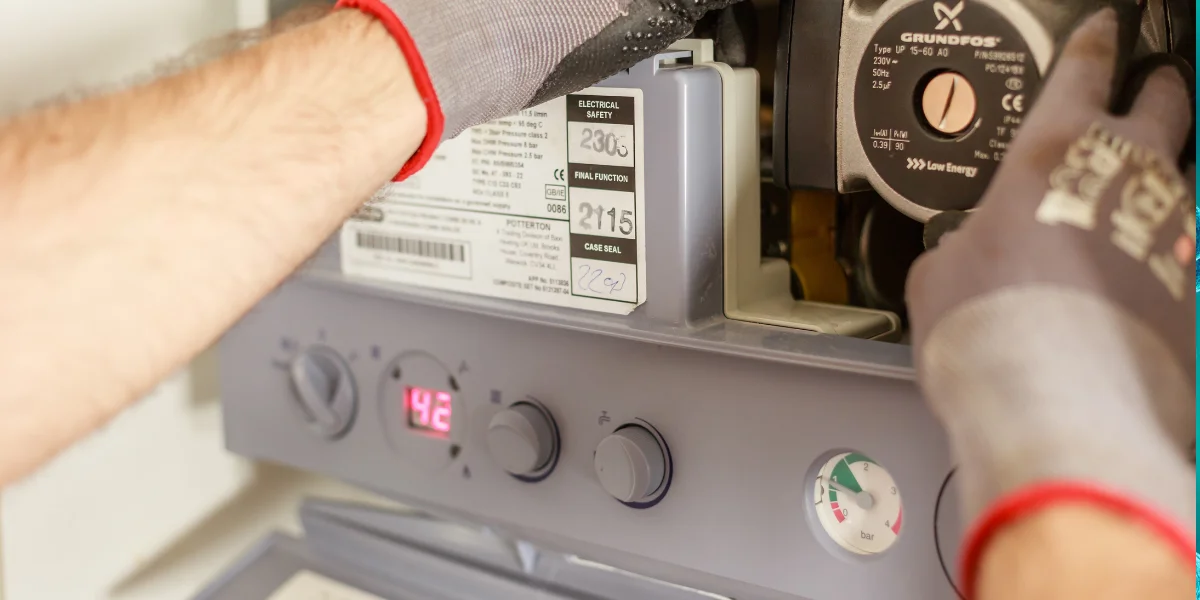 A safety check being carried out on a gas boiler.