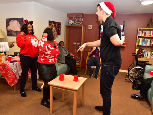 Party guests play games together.